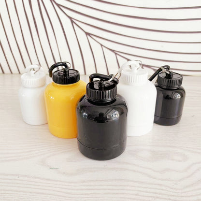 NUTRIVIBE Keychain Protein Funnel is BPA-free, portable, and perfect for transferring protein powders easily into bottles anywhere, anytime.