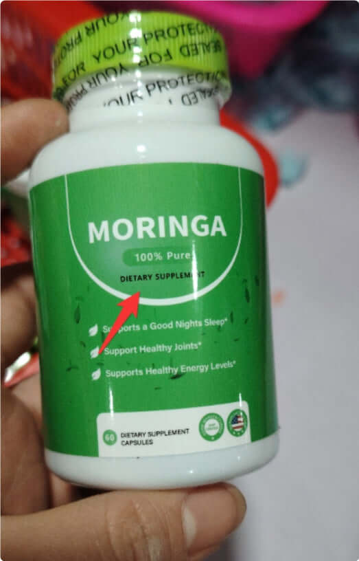 NUTRIVIBE Moringa Leaves Capsules bottle showing 100% pure label and dietary supplement information.